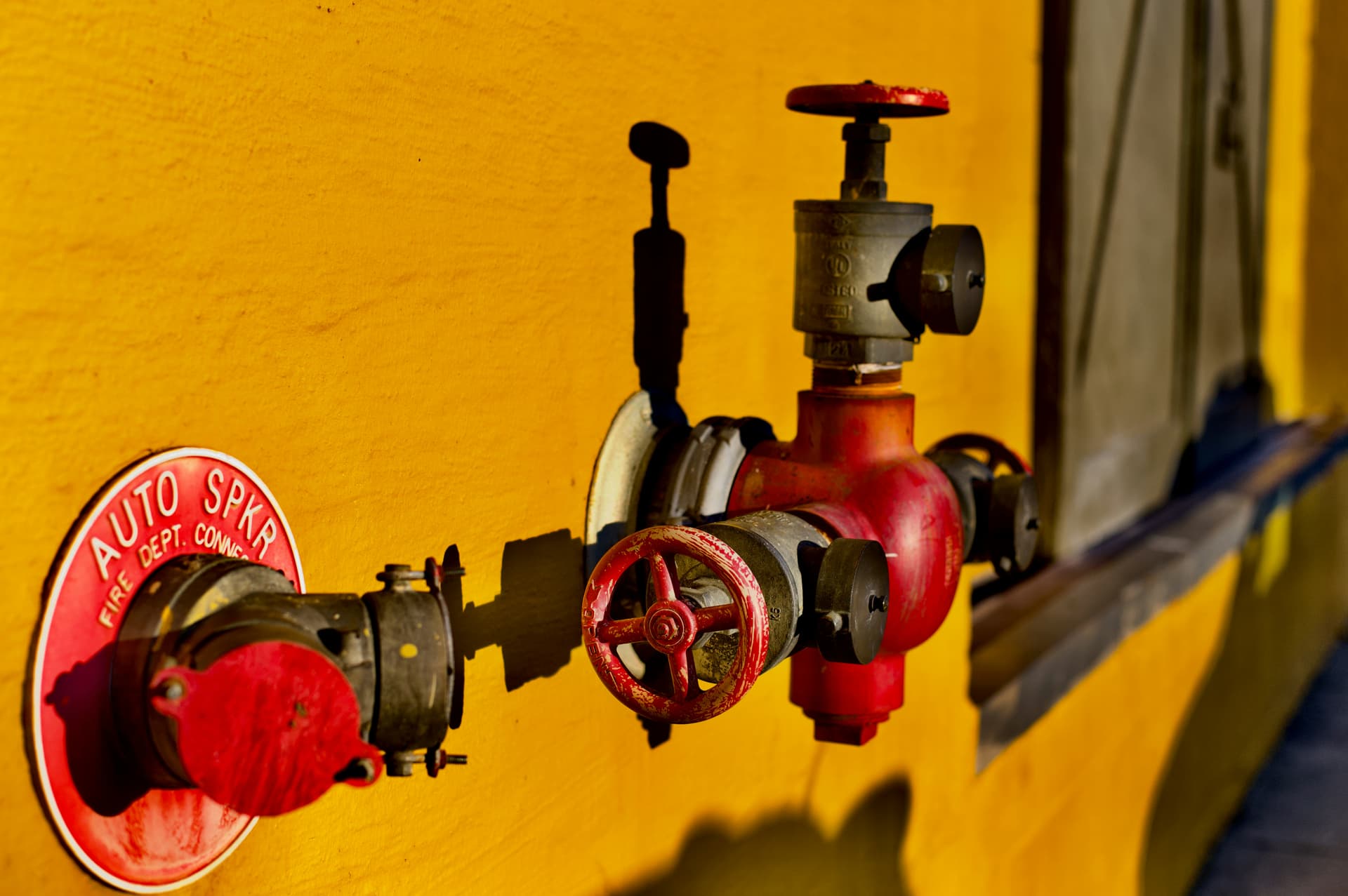 close up on a pressure valve system on the side of a boiler